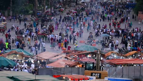 Crowds-of-pedestrians-walking-in-old-town-Medina-in-Marrakesh,-Morocco.