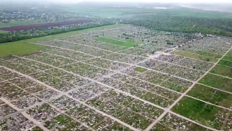 An-aerial-over-a-vast-cemetery-of-headstones-honors-veterans