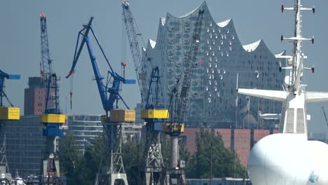 Opera-Elbphilharmonie-with-loadingcranes,-harbour-of-Hamburg,-4K