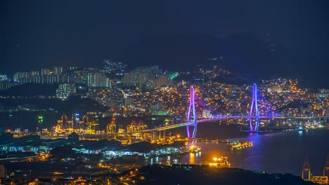 4K,-Zeitraffer-Ansicht-von-Busan-in-der-Nacht-mit-einer-Brücke-aus-Südkorea