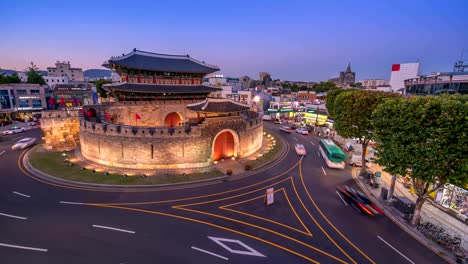 Time-Lapse-Hwaseong-Fortress-Gate,-Suwon,-and-traffic-in-Seoul,-South-Korea.