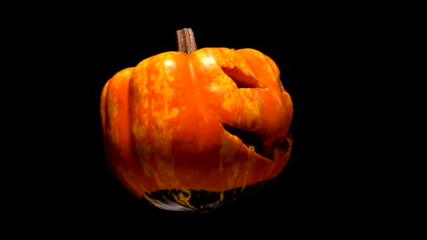 horrible-and-terrible-burning-pumpkin-with-cut-out-eyes