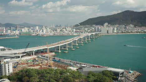 Aerial-view-of-Songdo-Beach-Skywalk,-Busan