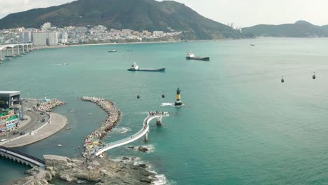 Aerial-view-of-Songdo-Beach-Skywalk,-Busan