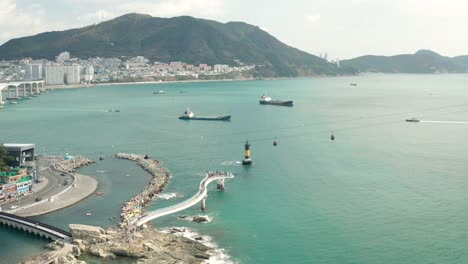 Aerial-view-of-Songdo-Beach-Skywalk,-Busan