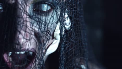 4k-Halloween-Shot-of-a-Horror-Woman-Mermaid-Turning-fast-with-White-Eyes