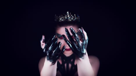 4K-Halloween-Horror-Woman-Posing-with-Black-Hands