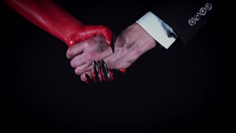 4k-Horror-Devil-Shaking-Hand-with-Business-Man