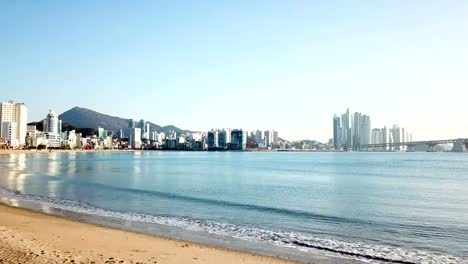 Gwangan-Bridge-and-Haeundae-aerial-view-at-Sunrise,-Busan,-South-Korea.