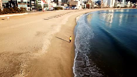 Vista-aérea-puente-de-Gwangan-y-Haeundae-en-Busan,-Corea-del-sur,-salida-del-sol.