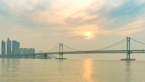 Busan-city-skyline-Gwangan-bridge-sunrise-timelapse,-Busan,-South-Korea-4K-Time-lapse