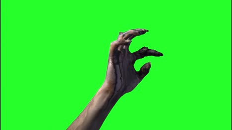 zombie-hand-on-a-green-background-on-Halloween