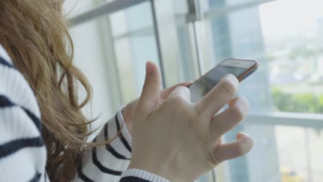 Young-Woman-use-of-mobile-phone