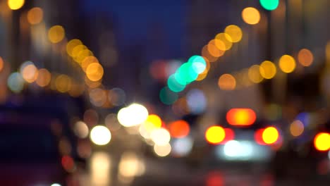 Defocused-city-car-traffic-on-a-busy-street/-Gran-Via/-in-central-Madrid