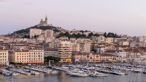 Marseille-France-time-lapse-4K,-city-skyline-day-to-night-timelapse-at-Vieux-Port