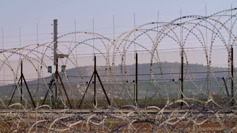 Border-fence-between-Israel-and-West-Bank.-barbed-wire-electronic-fence.