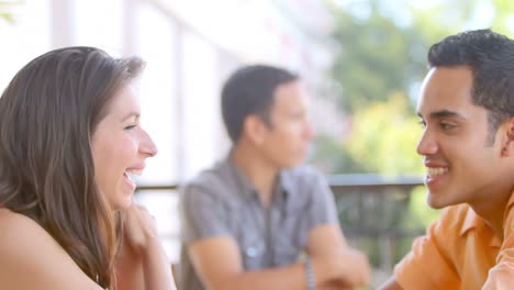 Guy-and-girl-sit-outside-talking