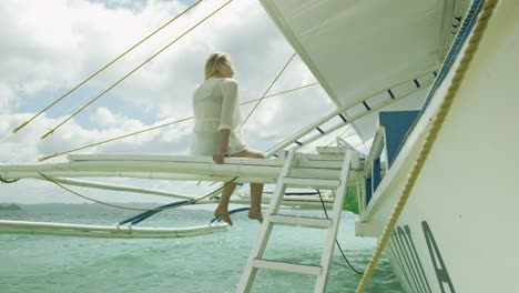 Girl-sitting-on-pontoon