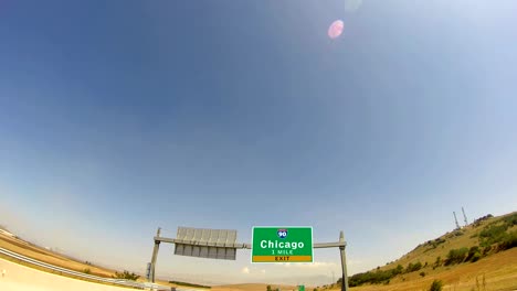 4K-Driving-on-Highway/interstate,--Exit-sign-of-the-City-Of-Chicago,-Illinois