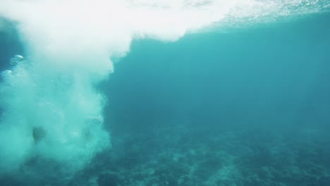 Underwater-Footage-of-Man-Jumping-into-Water-and-Swimming.-Diving-in-the-Coral-Reefs.