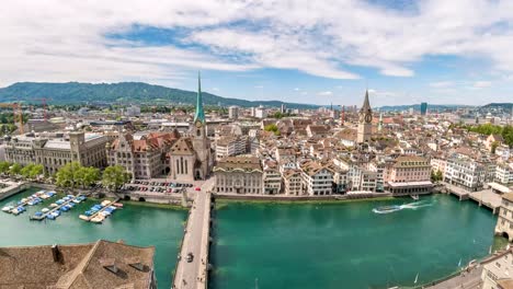 Vista-de-timelapse-de-horizonte-Zurich-vista-aérea-ciudad-de-Grossmunster,-lapso-de-tiempo-de-4K-de-Zurich,-Suiza