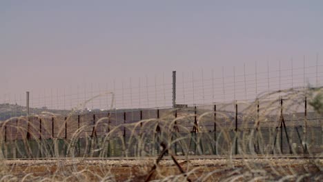 Border-fence-between-Israel-and-West-Bank.-barbed-wire-electronic-fence.