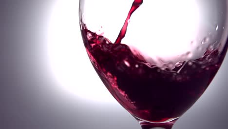 Red-wine-pouring-into-wine-glass