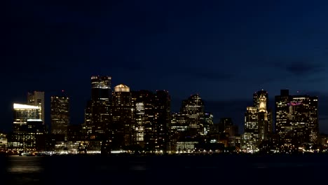 Time-lapse-close-up-tilt-shot-down-Boston-skyline-at-twilight