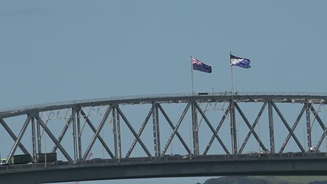 New-Zealand-National-flag-and-the-Silver-Fern-flag-on-Auckland-Harbour-Bridge