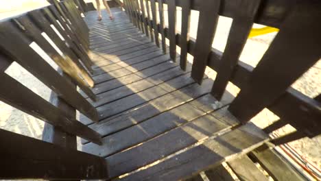 POV-footage-of-three-kids-playing-in-a-playground