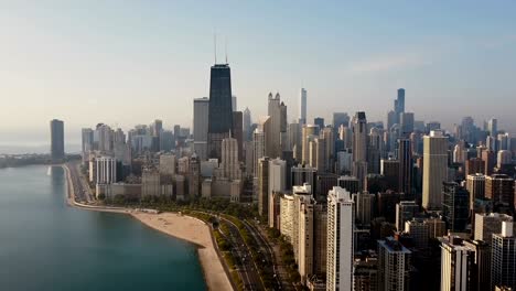 Aerial-view-of-the-Chicago,-America.-Busy-downtown,-city-centre-on-the-shore-of-the-Michigan-lake-on-the-dawn