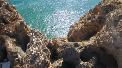 Aerial-view-of-Ponta-da-Piedade-rock-formations-in-Lagos,-Portugal