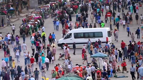 Crowds-of-pedestrians-walking-in-old-town-Medina-in-Marrakesh,-Morocco.