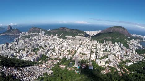Aerial-view-of-Cristo-Redentor,-Corcovado-and-the-city-of-Rio-de-Janeiro,-Brazil