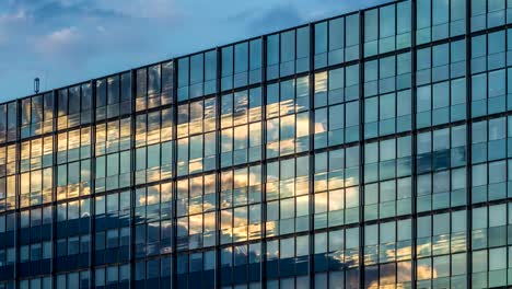 Cloud-mirroring-on-a-glass-facade-dslr-time-lapse