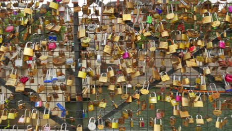 Love-lock-bridges-near-Notre-Dame-de-Paris,-France