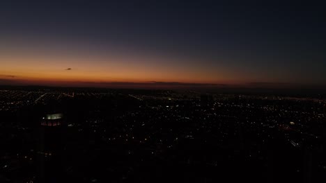 Sunset-behind-City-Skyline---Silhouettes