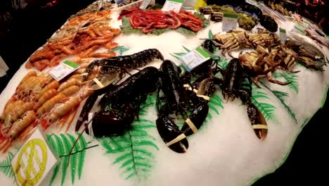 Showcase-with-Fresh-Seafood-in-La-Boqueria-Fish-Market.-Barcelona.-Spain