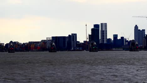 Zoom-out-from-Thames-river-barrier-in-London