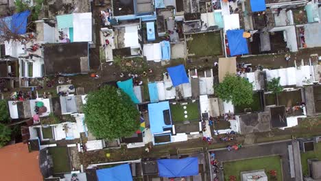 Messy-city-public-cemetery-parking-lot.-Turning-right-Drone-Aerial-Shot