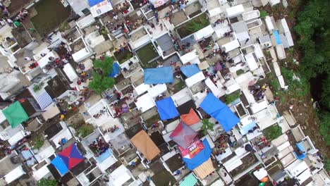 Messy-city-public-cemetery-parking-lot.-Turning-right-Drone-Aerial-Shot