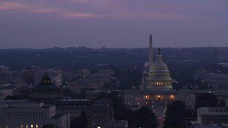 Aerial-view-of-the-Lincoln-Memorial,-Washington-Monument-and-Capitol-Building-at-sunset.