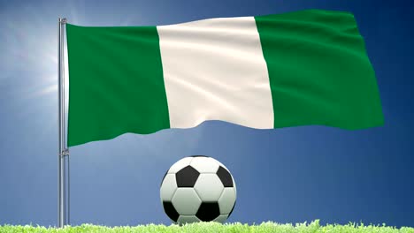 Fahne-von-Nigeria-zu-flattern-und-ein-Fußball-rollt-auf-dem-Rasen,-3D-Rendering,-4-k-Aufnahmen