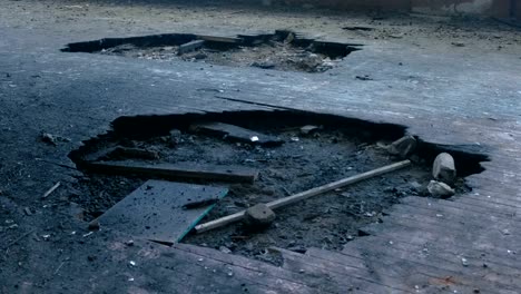 Part-of-the-burnt-wooden-floor-of-the-boards.