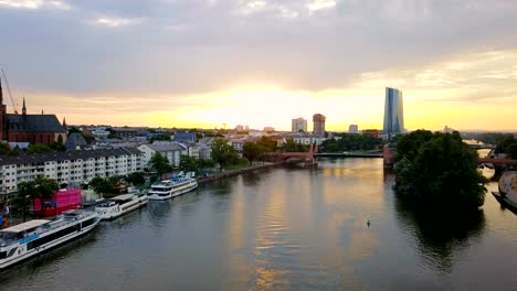 aerial-view-of--Frankfurt-city-with-river-and-skyscrapers-during-sunrise