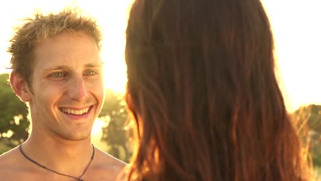 SLOW-MOTION:-Girlfriend-and-boyfriend-hugging-at-beautiful-sunset