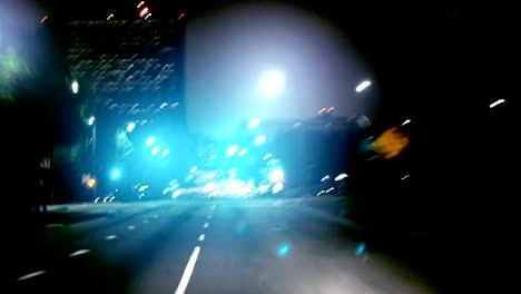 Drive-through-a-dark-urban-tunnel-at-night-(in-HD)