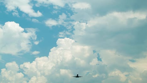 Jet-Airliner-on-Final-Approach-from-Below-with-Epic-Clouds