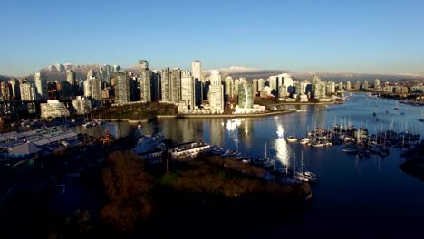 aerial-landing-of-downtown-and-mountains