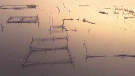 Rowo-Apung-Floating-Place-Jombor-Klaten-fishing-pond-aerial-view-at-sunrise,-Yogyakarta,-Indonesia